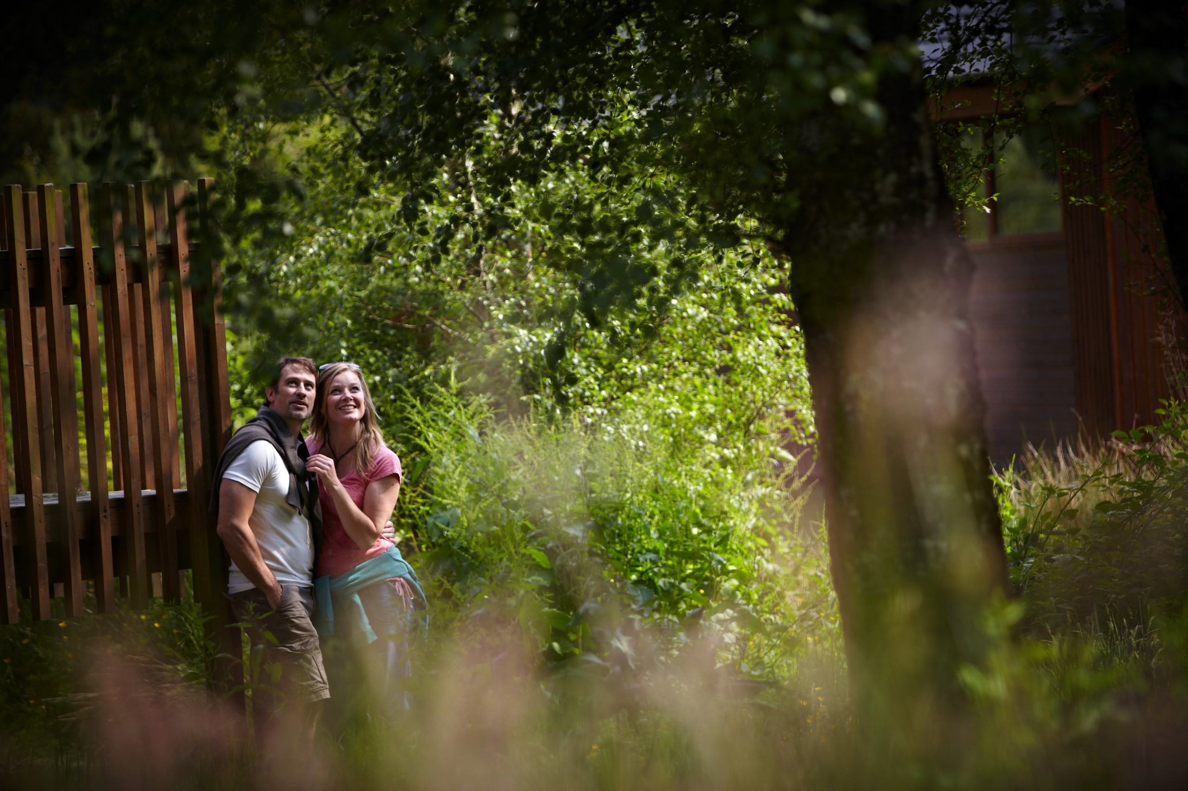 couple in the forest happy