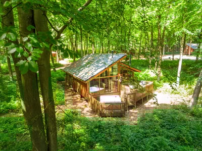 Exterior view of hot tub cabin at Blackwood Forest, Forest Holidays