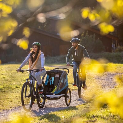 A family enjoying a cycling holiday at Forest Holidays