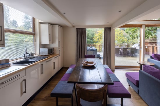 Golden Oak Treehouse dining area at Deerpark, Cornwall