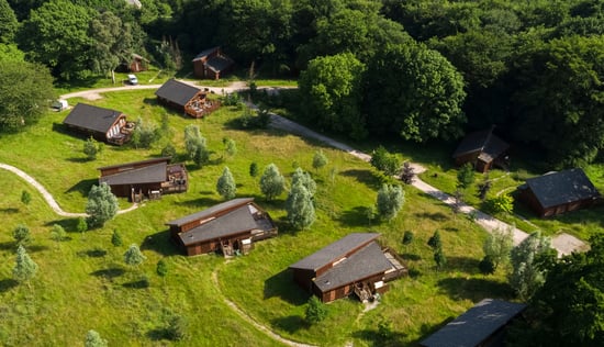 Exterior view of the Golden Oak cabins at Forest of Dean, Forest Holidays
