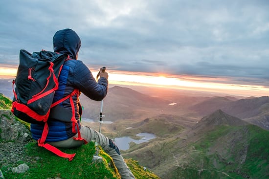 Person walking at sunrise