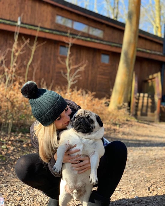 Dog and owner enjoying the outdoors at Forest Holidays 