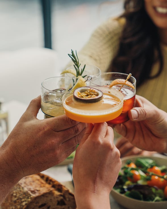 Group of people drinking cocktails
