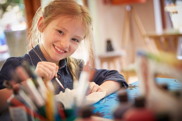 Child clay pottery painting