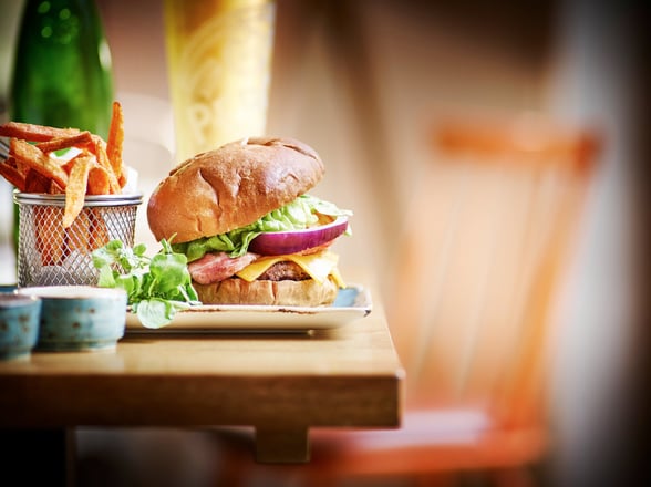 Close up of a burger available to order at the Forest Retreat, Forest Holidays