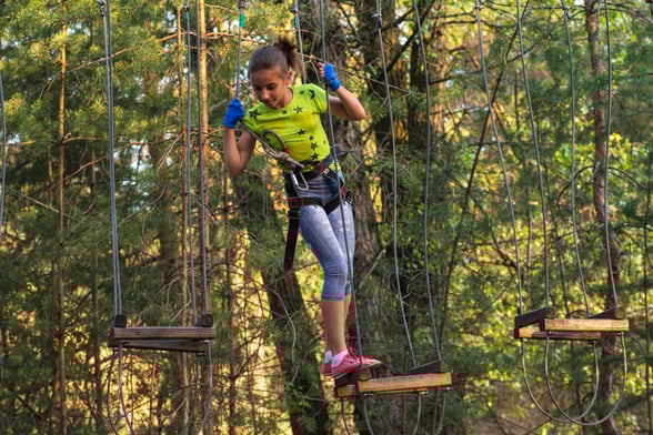 girl on go ape swings