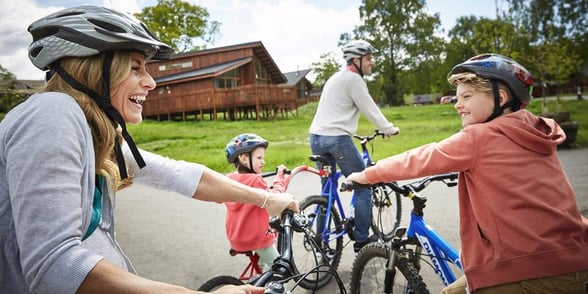 Family cycling at Forest of Dean, Forest Holidays