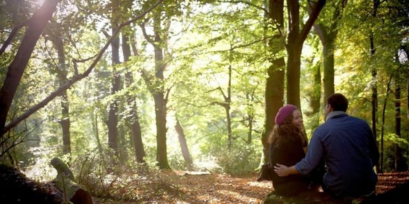 A couple enjoying a long walk through the forest at Forest of Dean, Forest Holidays