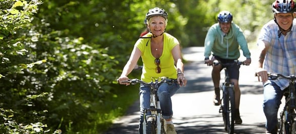 A group cycling at Sherwood Forest, Forest Holidays