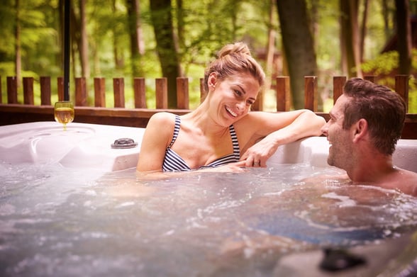 Couple in the hot tub mini moon