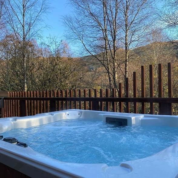 Hot tub view at Strathyre, Forest Holidays by @gwylie