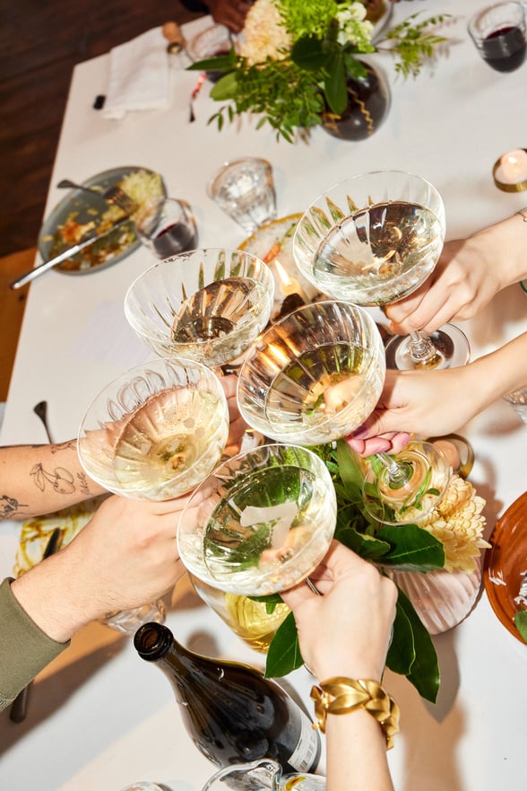 People clinking glasses of champagne