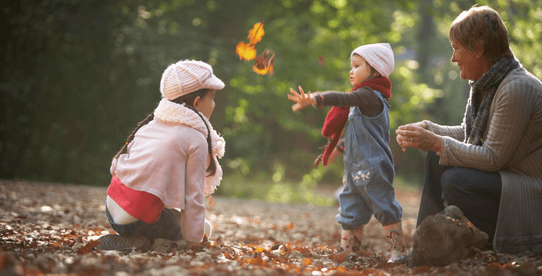 Family playing in the forest
