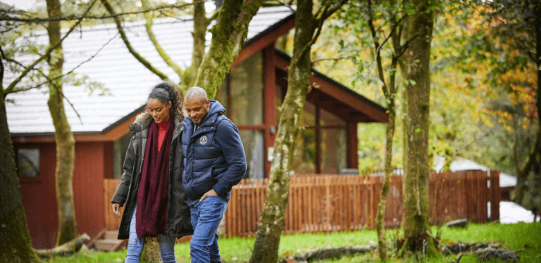 Couple walking at Beddgelert Forest Holidays