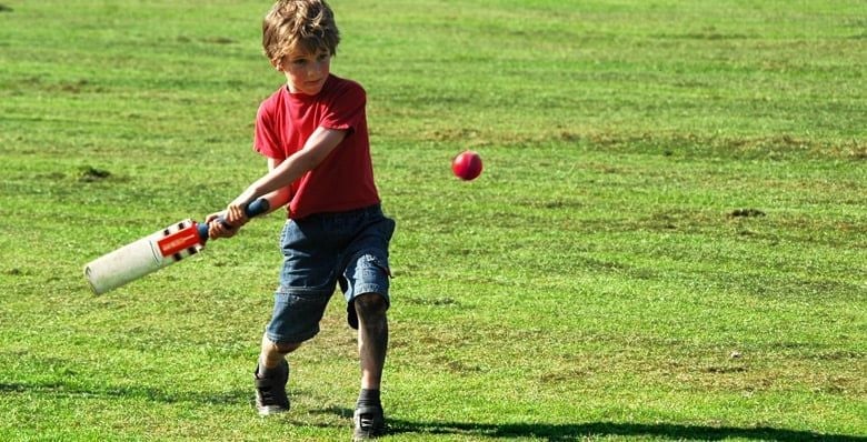 Boy playing cricket 
