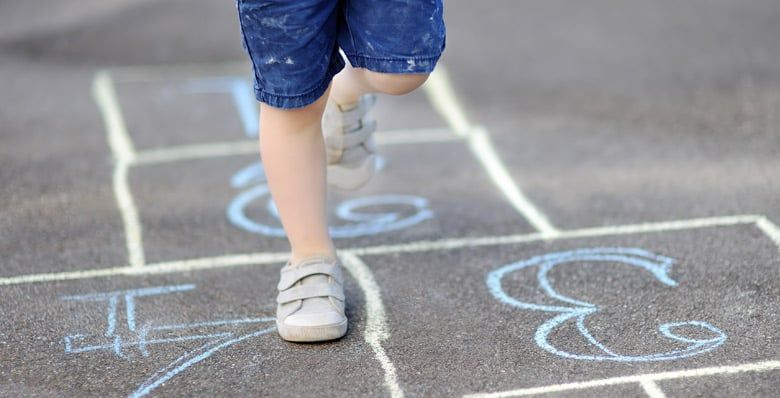 Child doing Hopscotch 