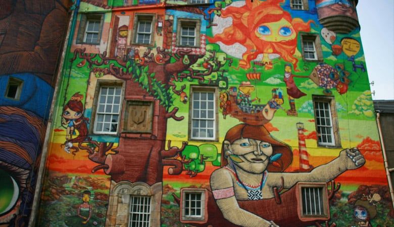Colourful graffiti artwork wrapped around Kelburn Castle