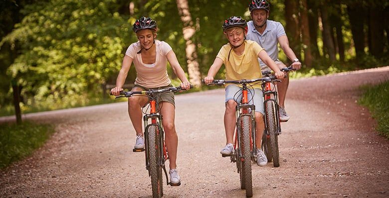 Family cycling in Blackwood forest